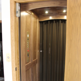 Fox Valley Elevator-gallery-arched-brushed-brass